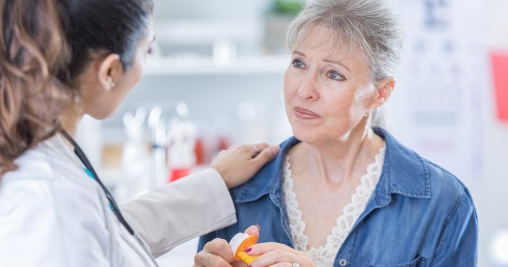 pulmonary fibrosis symptoms and nintedanib treatment costs with a concerned patient during medical consultation